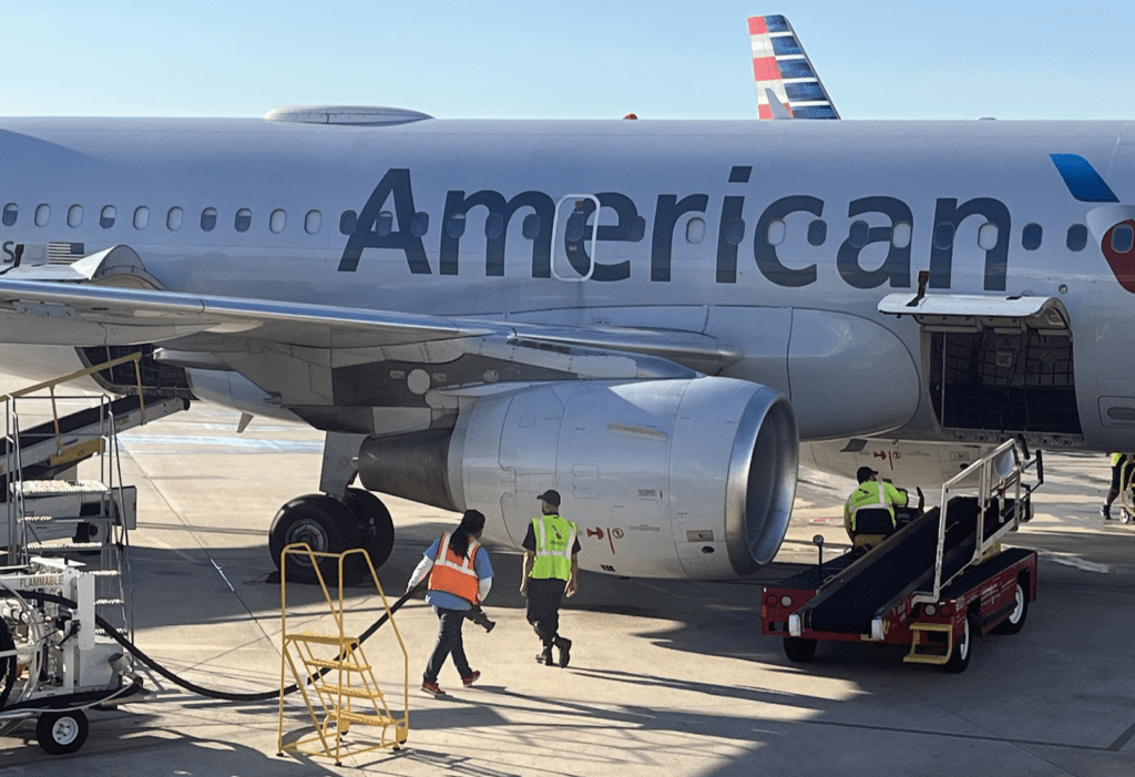 Airline workers on a job site